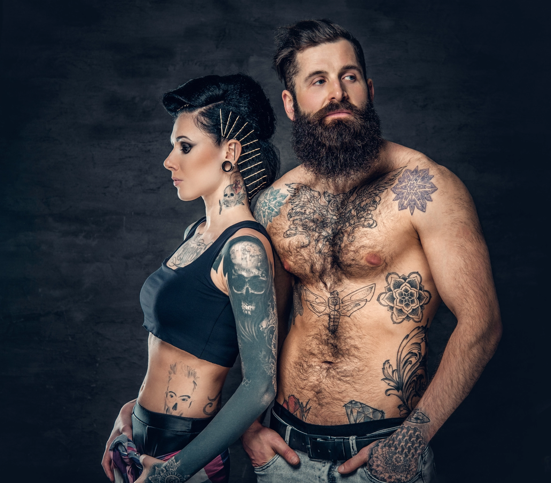 portriate of tattooed bearded male and woman